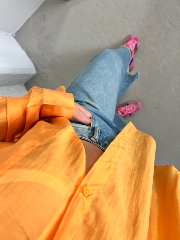 Orange silk shirt