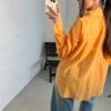 Orange silk shirt
