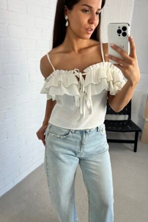 Ruffled white top